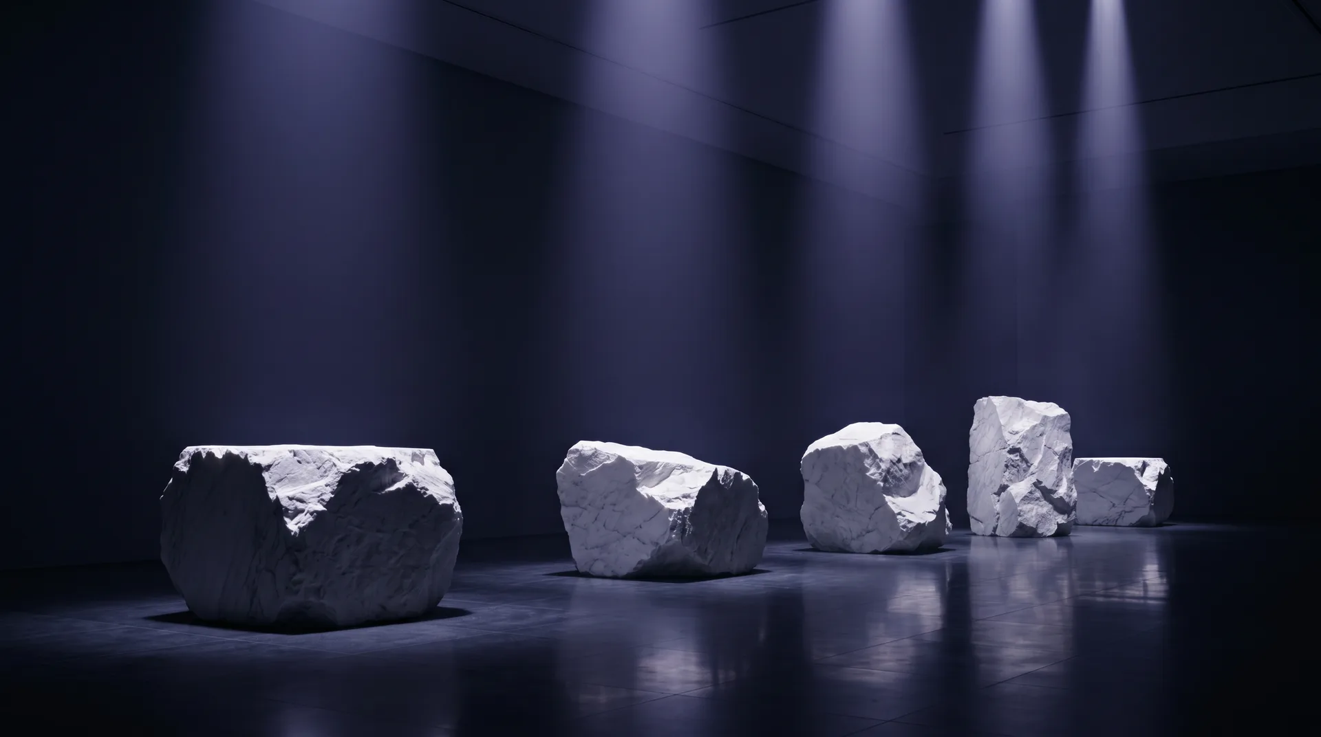 Five raw marble blocks at rest in a dark hall, each under its own shaft of light.